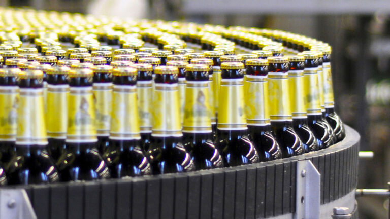 Bottled beverages on conveyor