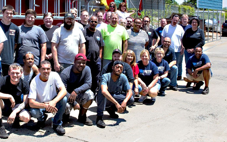 A diverse group of people in a group photo